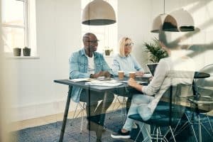 diverse employees in modern conference room