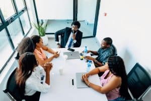 Group of colleagues sitting at a conference table